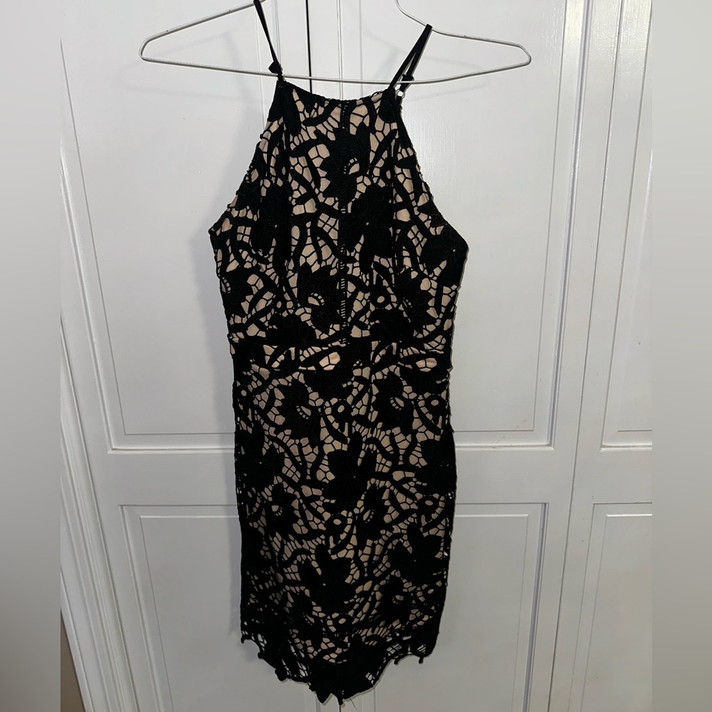 Women’s mini fitted tan and black dress